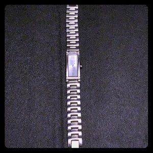Women’s Anne Klein bracelet watch.